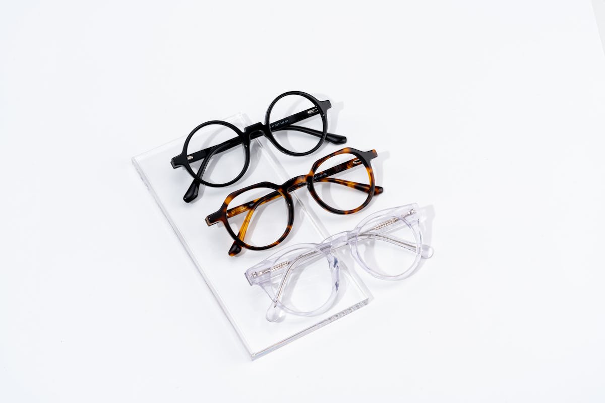 Three trendy eyeglass frames - black tortoise and transparent